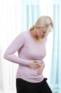 Woman with abdominal pain clipart