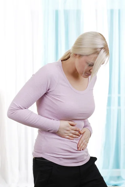 Woman with abdominal pain — Stock Photo, Image