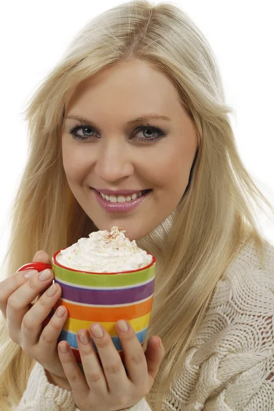 Happy woman drunks hot beverage — Stock Photo, Image