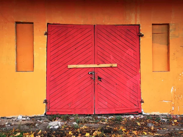 Bright Red Old Wooden Garage Door Double Entrance Door Orange Stock Image