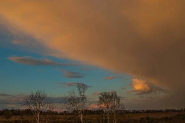 stock image Beautiful sunset and dramatic clouds in the sky.