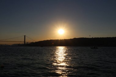 Günbatımı fotoğrafları farklı zamanlarda ve farklı yerlerde çekildi..