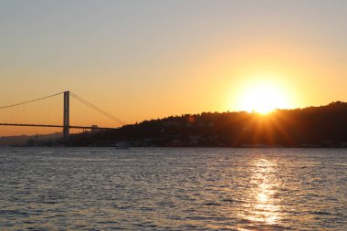 Günbatımı fotoğrafları farklı zamanlarda ve farklı yerlerde çekildi..