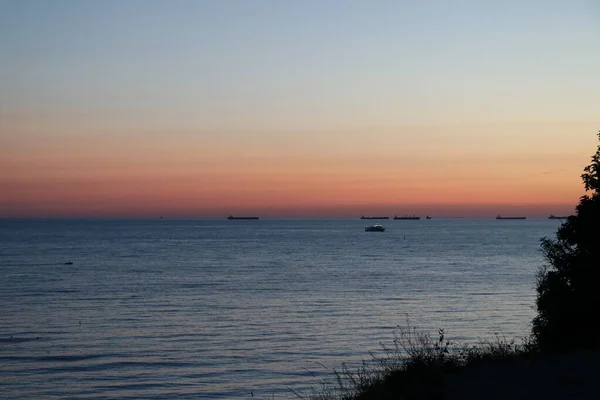 Ηλιοβασίλεμα Πάνω Από Θάλασσα Διάφορα Μέρη Του Κόσμου — Φωτογραφία Αρχείου