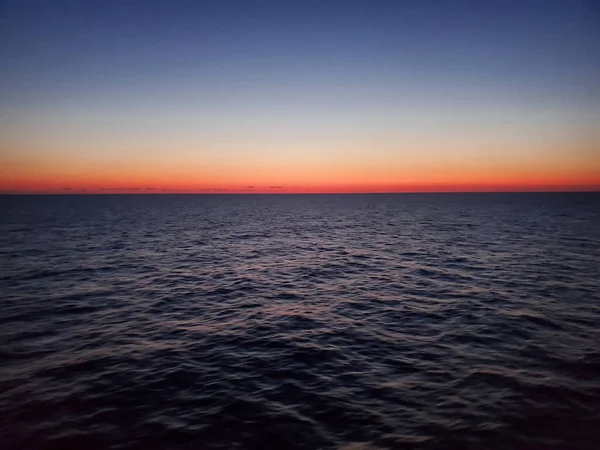 在世界不同地区的海面上落日 — 图库照片