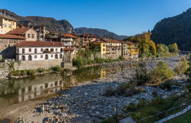 The beautiful village of Varallo, during fall season, in Valsesia (Sesia Valley). Province of Vercelli, Piedmont, Italy.