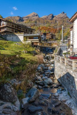 The beautiful village of Alagna Valsesia, during fall season, in Valsesia (Sesia Valley). Province of Vercelli, Piedmont, Italy.