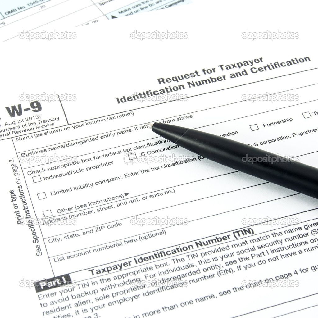 Tax form W9 and pen Stock Photo by ©rakijung 49469125