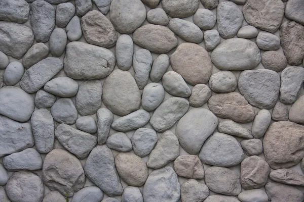 Owalny Kamień ściana — Zdjęcie stockowe