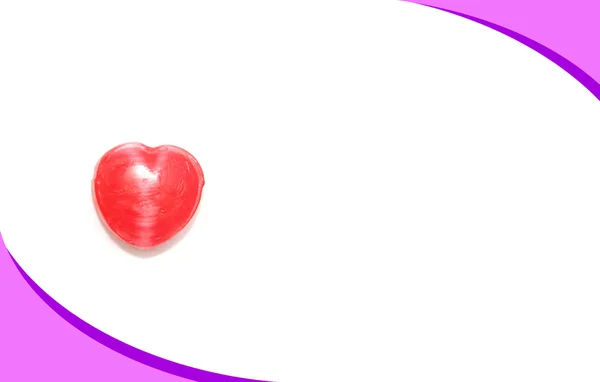 Herzbonbons auf rosa Karte — Stockfoto