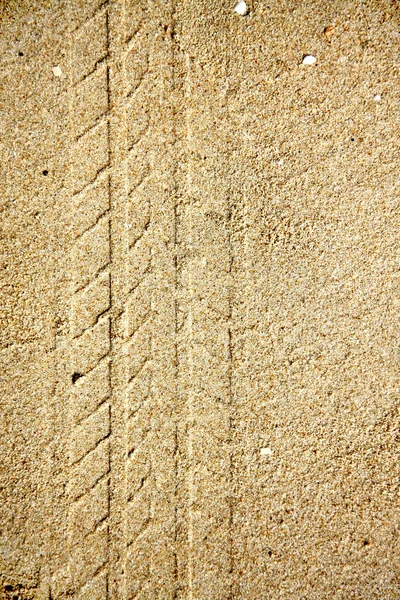 Tire tracks on sand — Stock Photo, Image