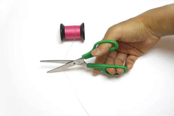 Рукоятка ножницы резьба розовые нитки — стоковое фото