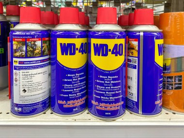 Bangkok Thailand 13 July 2022; WD-40 penetrating oil and water-displacing spray on the shelf in the Thai Wadsadu 