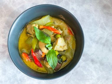 Thai food Green curry chicken on the table