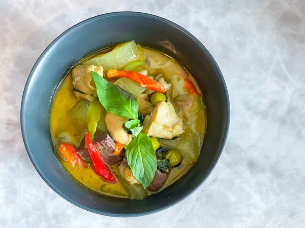 Thai food Green curry chicken on the table