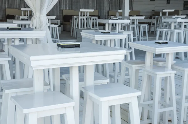 White stools and tables — Stock Photo, Image