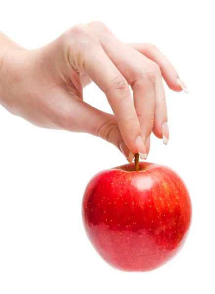 Mão feminina com uma maçã — Fotografia de Stock