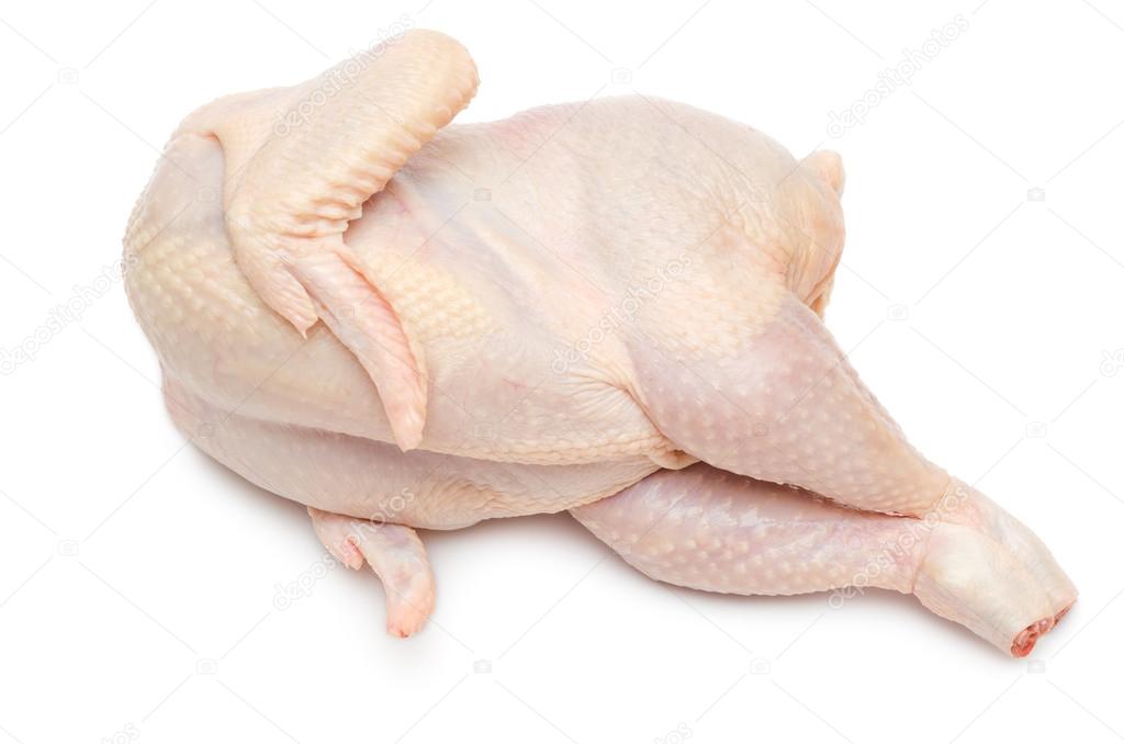 Raw chicken lies on one side