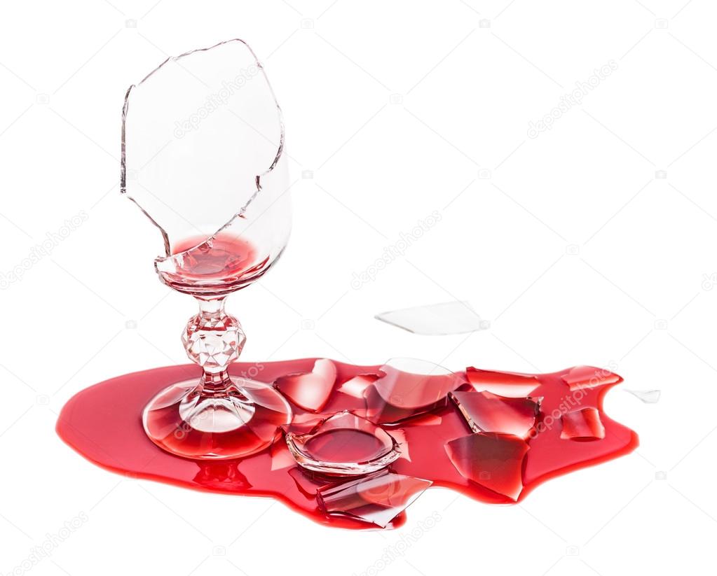 Broken glass poured red wine