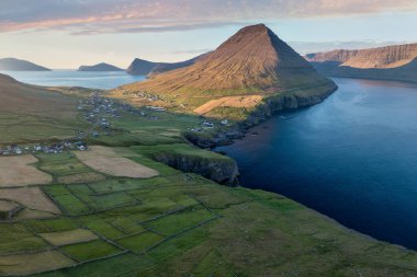 Amazinf summer aerial view of Faroe Islands, Denmark, Europe. Beauty of nature concept background.