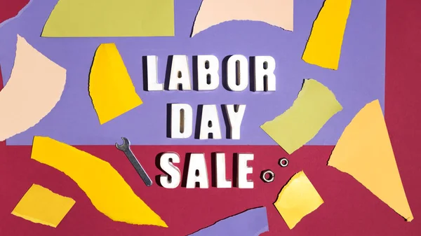 Labor day sale banner, colorfull paper background, white concrete letter, hard shadows