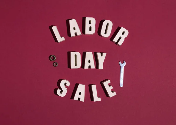 Labor day sale banner, colorfull paper background, white concrete letter, hard shadows