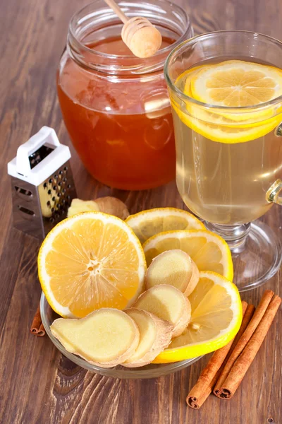 Hot ginger lemon tea, honey and cinnamon — Stock Photo, Image