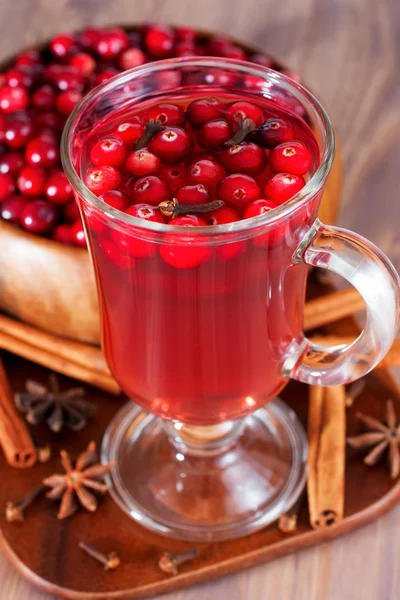 Hot drink with cranberries for Christmas — Stock Photo, Image