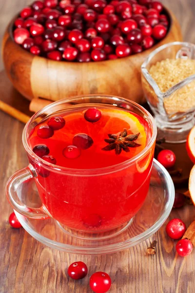 Hot mulled wine with cranberries and orange — Stock Photo, Image