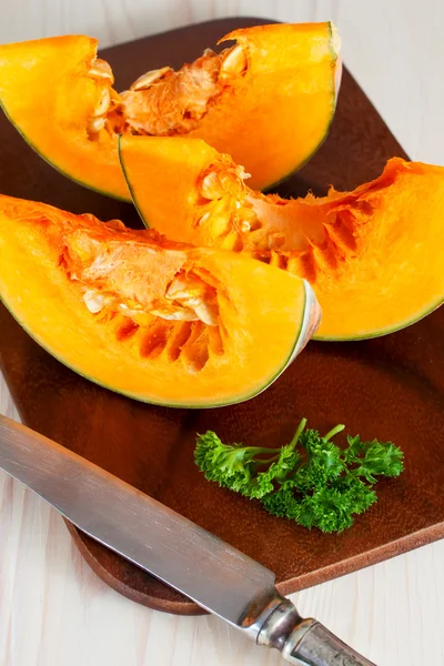 Pumpkin with pepper and parsley — Stock Photo, Image