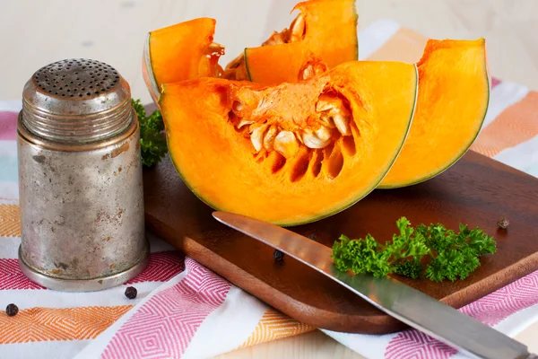 Pumpkin with pepper and parsley — Stock Photo, Image