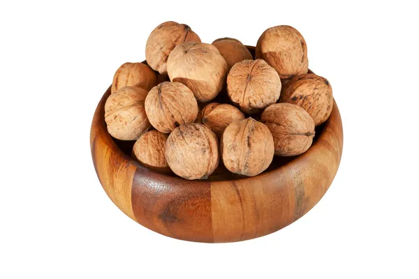 Nueces en cuenco de madera — Foto de Stock