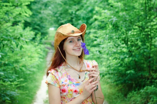 Beautiful girl with bell flowers — Stock Photo, Image