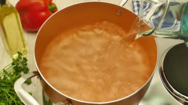 Cooking Italian Pasta for Lunch. Italian pasta cooking details in the kitchen