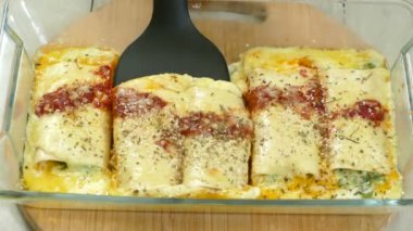 The canelloni are ready to eat. Cooking cenelloni Italian food for lunch. In close-up