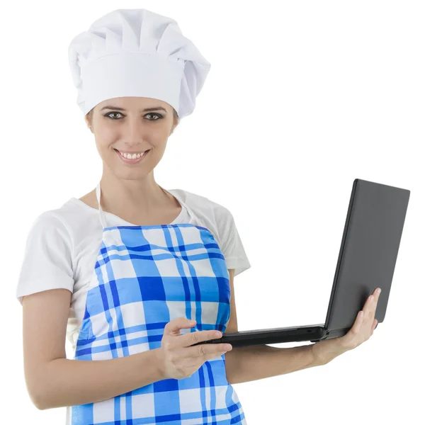 Mulher cozinheiro com laptop — Fotografia de Stock