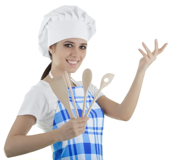 Mulher cozinheiro com utensílios de madeira — Fotografia de Stock