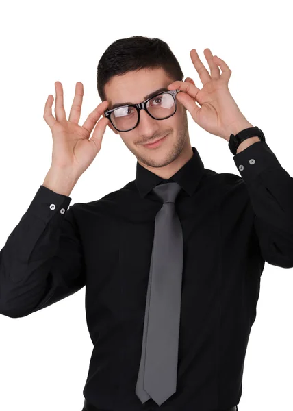 Young Man Putting On Glasses — Stock Photo, Image