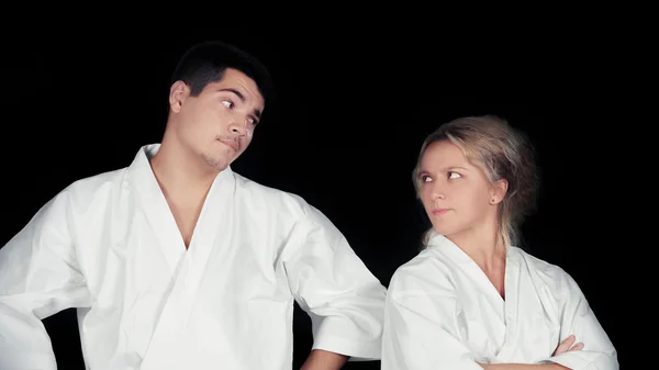 Pareja de Karate Usando Kimonos Parados Juntos —  Fotos de Stock