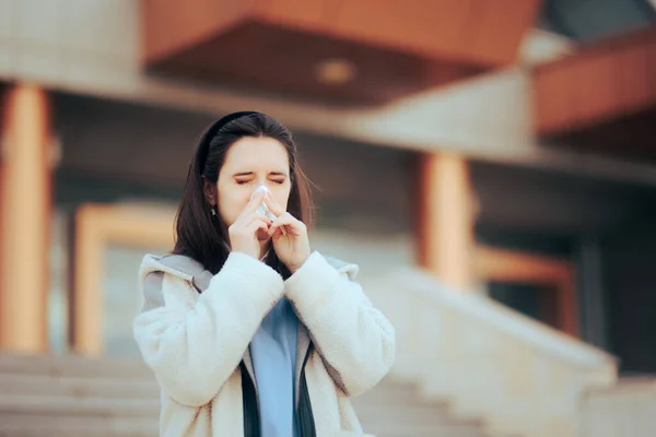 Sick Woman Blowing Her Nose Outdoors — Stockfoto