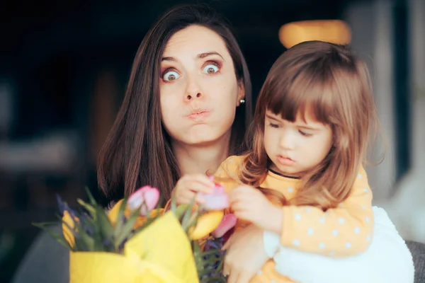 Tired Mom Receiving Flower Bouquet Her Lovely Daughter — Stock Photo, Image