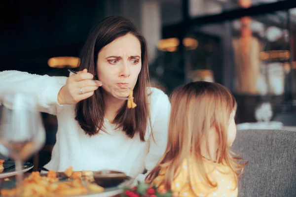 Angry Mom Force Feeding Her Little Toddler with No Appetite