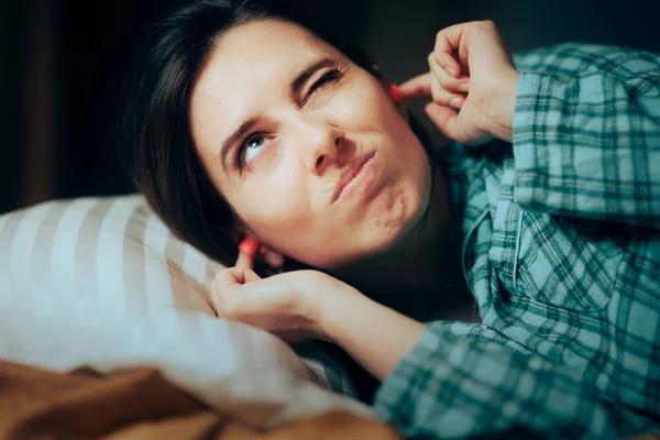 Stressed Woman Using Ear Plugs Trying Sleep — Photo