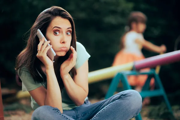 Mom talking on the Phone Hiding Secrets from Her Little Daughter