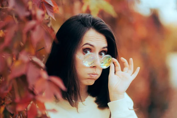 Woman Wearing Funny Glasses Having Surprised Reaction —  Fotos de Stock