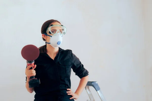 Woman Wearing Protection Gear Holding Polishing Machine — Stockfoto