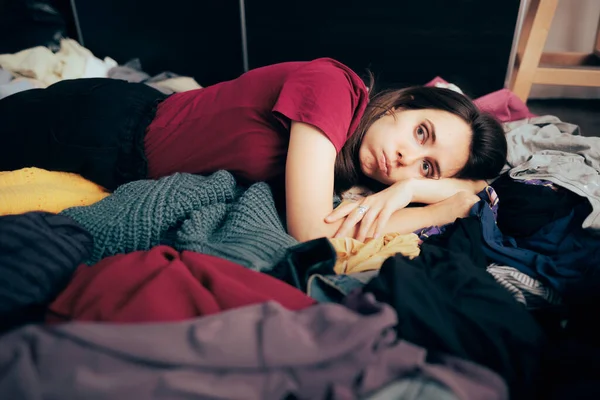 Unhappy Woman Sitting Floor Pile Clothes — Stock Photo, Image