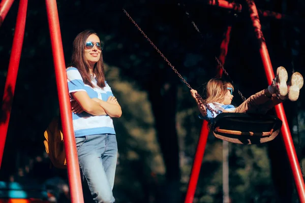 Cool Relaxed Mom Supervising Her Child Playground —  Fotos de Stock