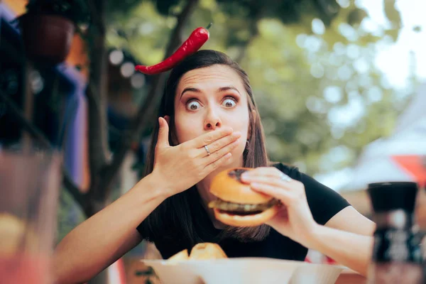 Funny Woman Trying Spicey Burger Restaurant — Stok Foto