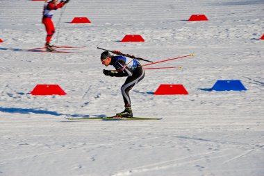 Biatlon - sporcu - sıcak yarış